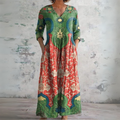 Maxi knit dress with floral pattern and V-neckline
