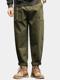 Utility woven cargo pants with flap pockets and pleated waist
